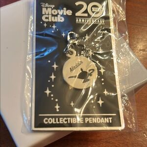 Disney Movie Club 20th Anniversary collectible pendant Aladdin silver tone nwt